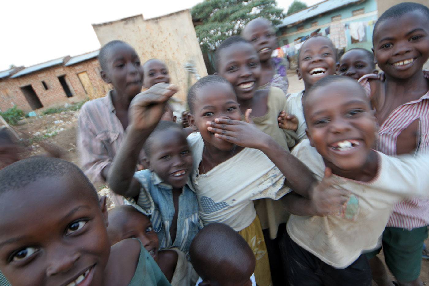 a group of smiling children in a developing country