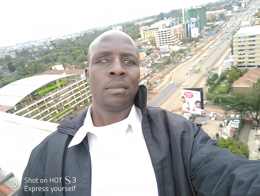 Padox Aouki posing on a balcony