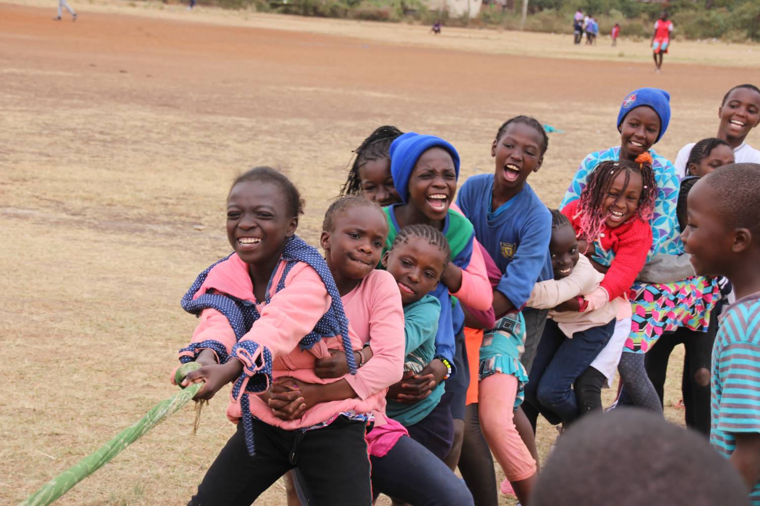children playing tug-of-war