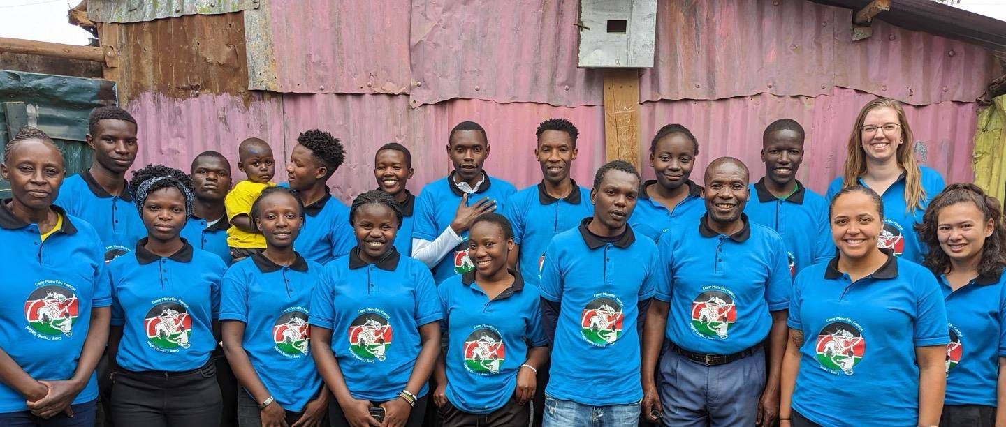 a group of people standing next to each other